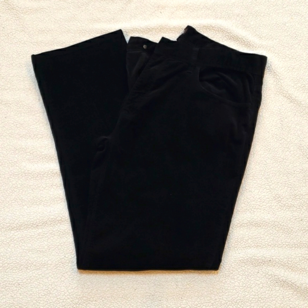 Black corduroy pants by Michael Kors .